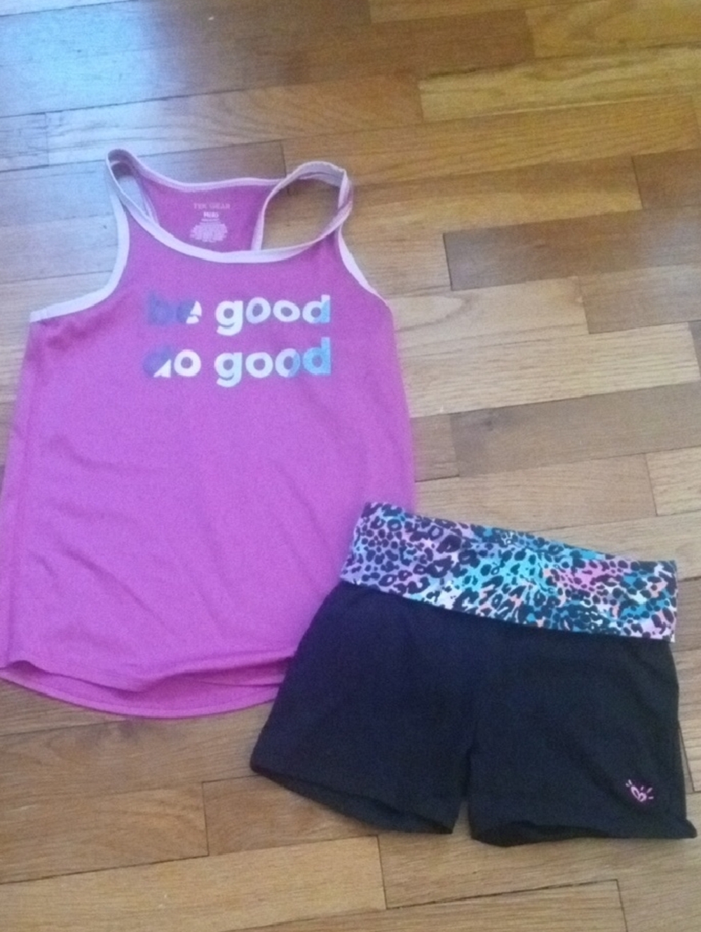girl med drifit tank and shorts